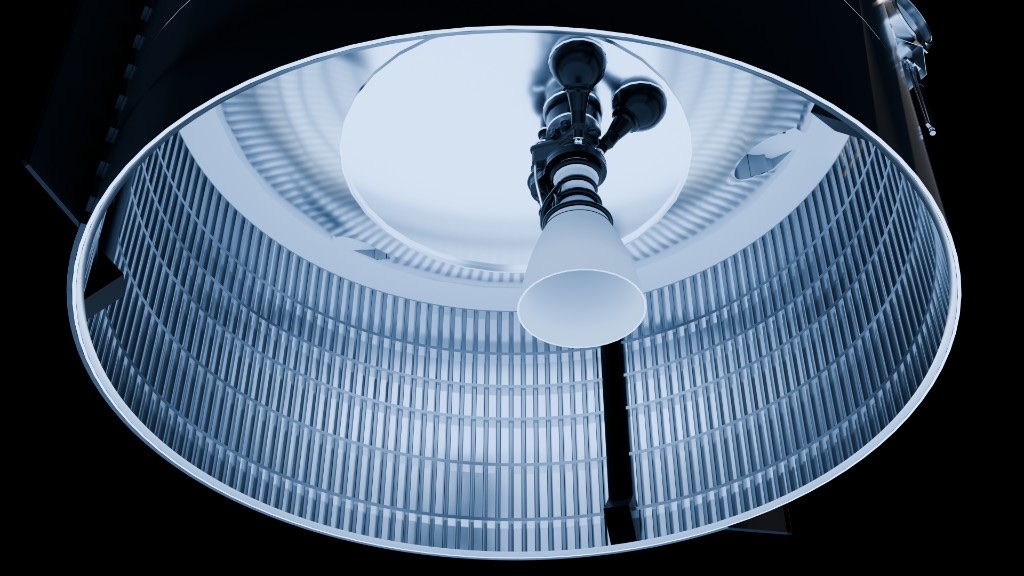 Looking up into a ribbed engine interior with central white cone
